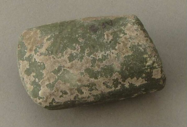 Stone axe blade (fragment)