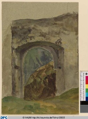Tor in einer Steinmauer mit Landschaftsausblick