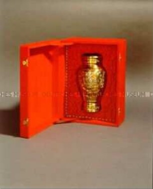 Vase in roter Kassette