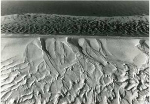 Muster und Strukturen im Sand : Muster und Strukturen im Küstensand.
