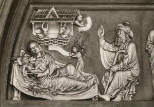 Darstellung von Christi Geburt im Tympanon des Westportals