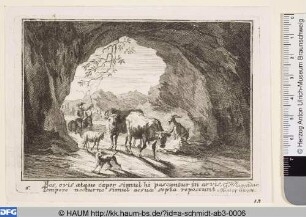Auf einem Esel reitender Hirte treibt seine Herde in eine Berghöhle