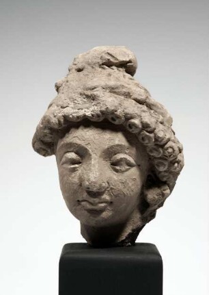 Kopf eines Bodhisattva (?) mit Ringellocken