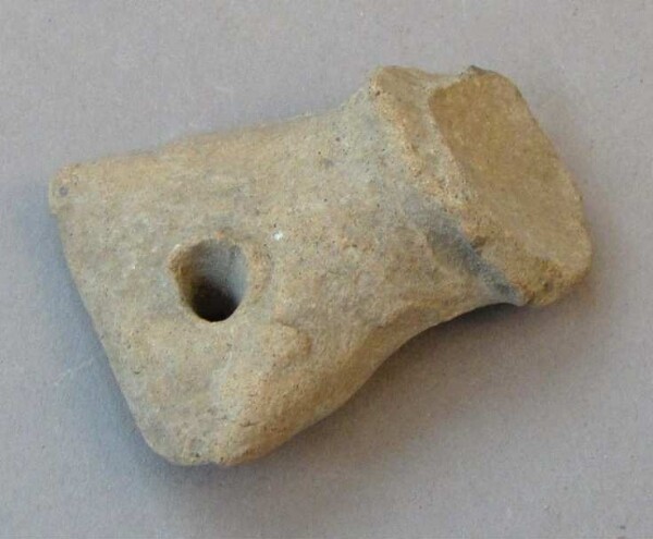 Fragment of a clay vessel