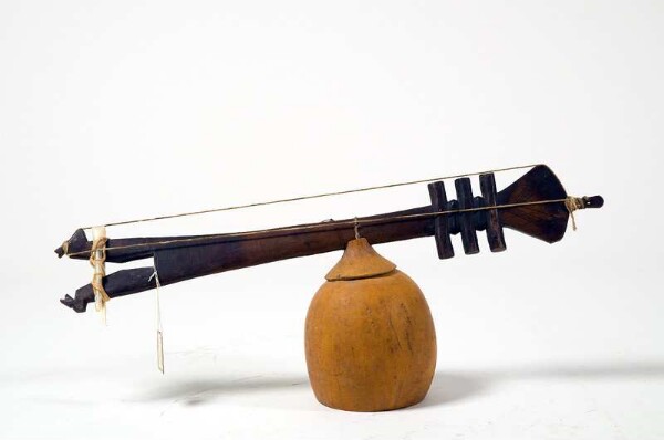 Stick zither with resonator