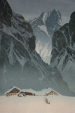 Häusergruppe vor Bergmassiv