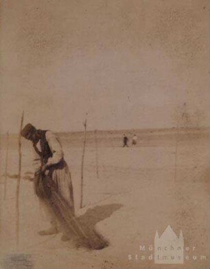 Söhren. Fischer mit Fischnetz am Strand