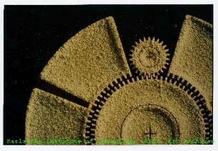 Rasterelektronenmikroskop (REM)-Aufnahme zweier Mikrozahnräder des Instituts für Mikrostrukturtechnik (IMT)