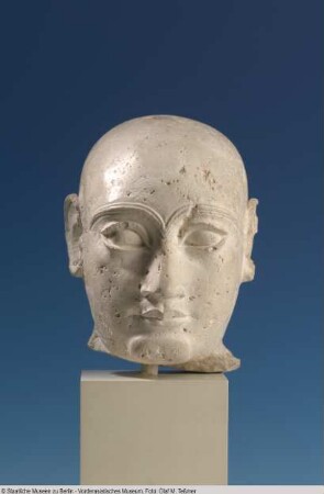 Kopf einer Männerstatuette