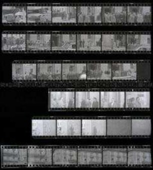 Schwarz-Weiß-Negative mit Aufnahmen der Indochinakonferenz zum Indochina- und Koreakrieg 1954 in Genf (Geschehen vor dem Gebäude, britischer Minister am Hotelfenster)