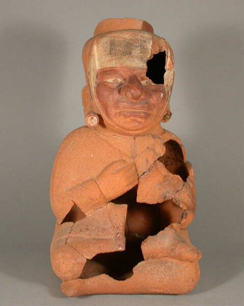 Seated anthropomorphic figure