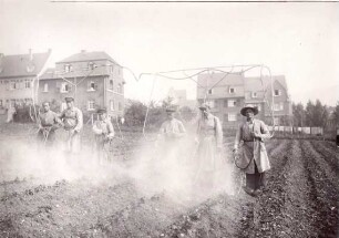 Foto Arbeiter beim Stäuben