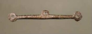 Kleiner Waagebalken (sog. Mithrassymbol)