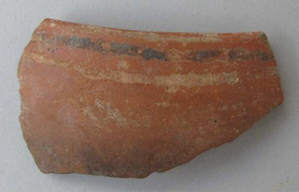 Rim sherd of a clay vessel