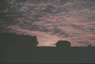Reisefotos. Haus bei Sonnenuntergang