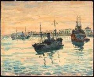 Drei ankernde Frachter im Hafen von Tripolis