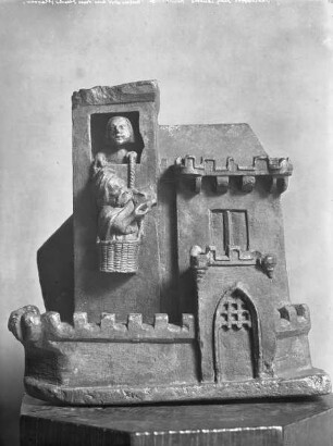 Steinkonsole: der Prophet Habakuk wird aus dem Fenster mit einem Korb gelassen