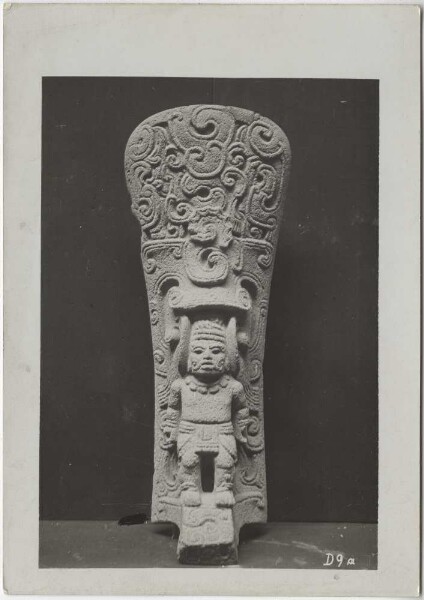 Stone sculpture of a prisoner of war (?) with rich symbolising ornamentation. Collection Guillermo de Heredia.