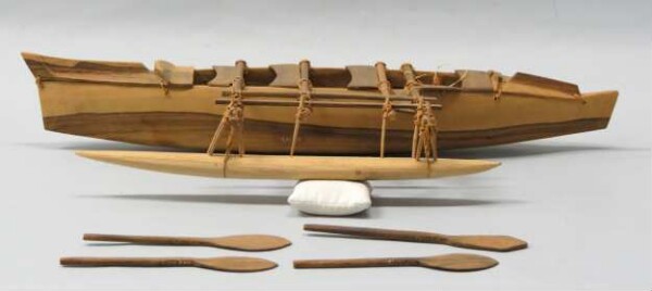 Model of an outrigger boat with accessories