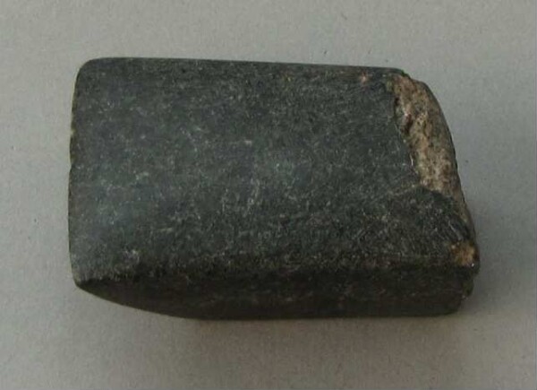 Stone axe blade (fragment)