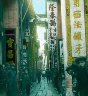 Kanton (Guangzhou), China. Straßenszene mit Einheimischen