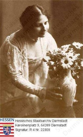 Dehmel-Coblenz, Ida geb. Coblenz gesch. Auerbach (1870-1942) / Porträt, eine Blumenvase auf Tisch stellend, Kniestück