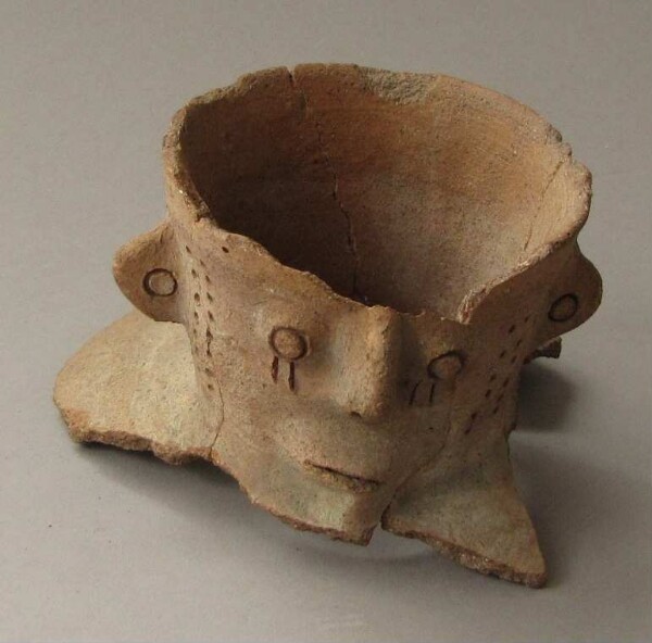 Fragment of a clay vessel