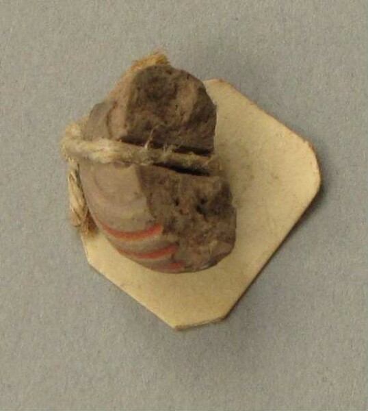 Spinning whorl (fragment)