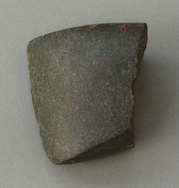 Stone axe blade (fragment)