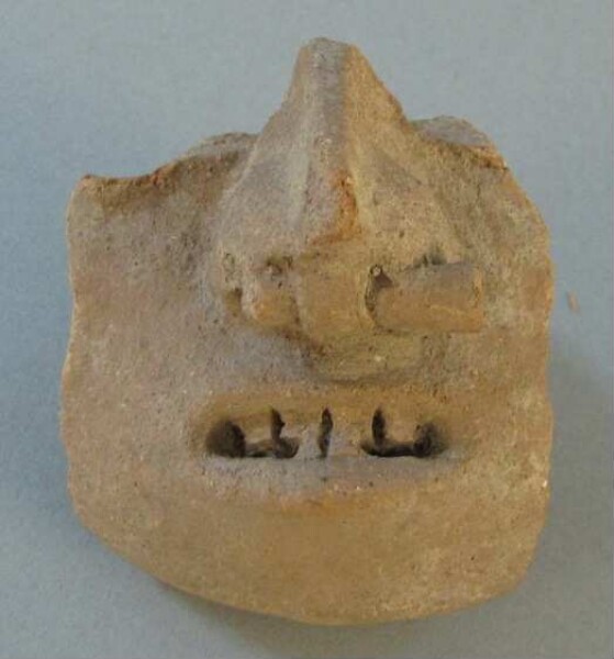 Clay head (fragment)