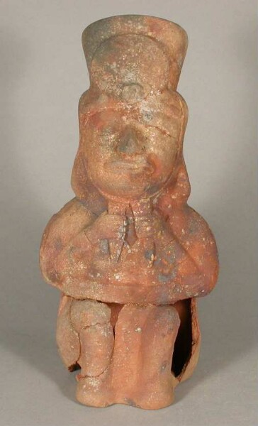 Figure anthropomorphe assise