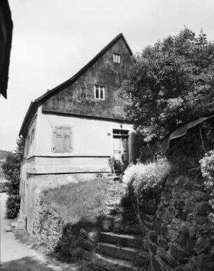 Eibenstock (Kreis Aue). "Steigerhaus" (Wohnhaus) mit Einfriedung, Vordere Rehmer Straße 27. Straßenansicht