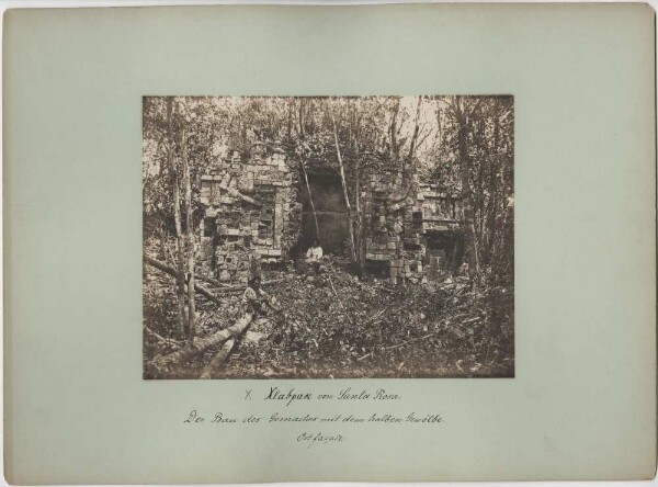 "The construction of the chamber with the half vault. East façade. (With two members of the expedition.) T. Maler's discovery."