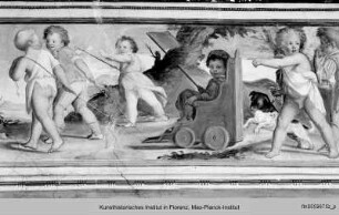 Friesfolge mit spielenden Kindern : Kinderspiel mit einem Wagen