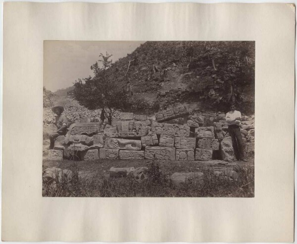 Debris of a hieroglyphic staircase. Mound 26 (with two members of the expedition).