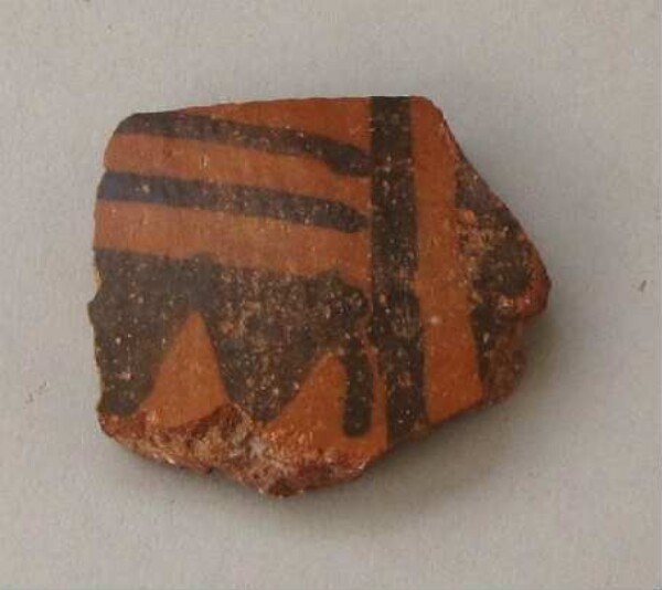 Fragment of a clay vessel