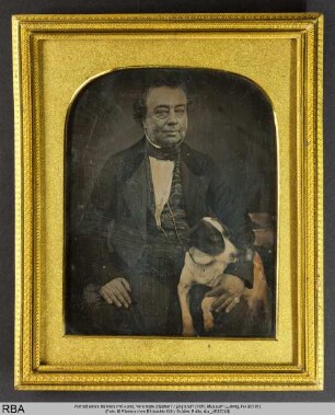 Portrait eines Mannes mit Hund