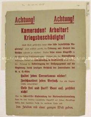 Großformatiges Flugblatt aus der Zeit der Novemberrevolution mit dem Aufruf zur Unterstützung der Volksbeauftragen und für die Einberufung einer Nationalversammlung (aufgeklebt)