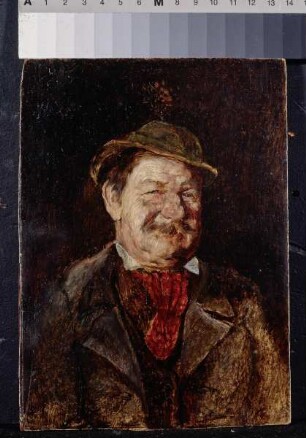 Schmunzelnder Bauer mit Filzhut und Gamsbart