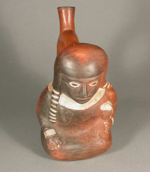 Seated anthropomorphic figure with child