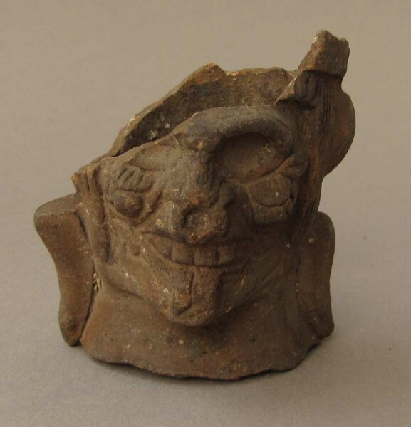 Clay head (fragment)