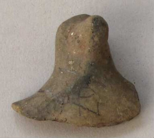 Figurine en argile (fragment de récipient)