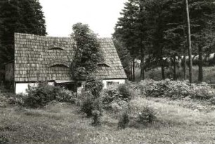 Zinnwald-Georgenfeld. Schindelgedecktes Begmannshaus, Goetheweg 15, Eingangsseite