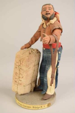 Genrefigur "Mann mit Gepäck"