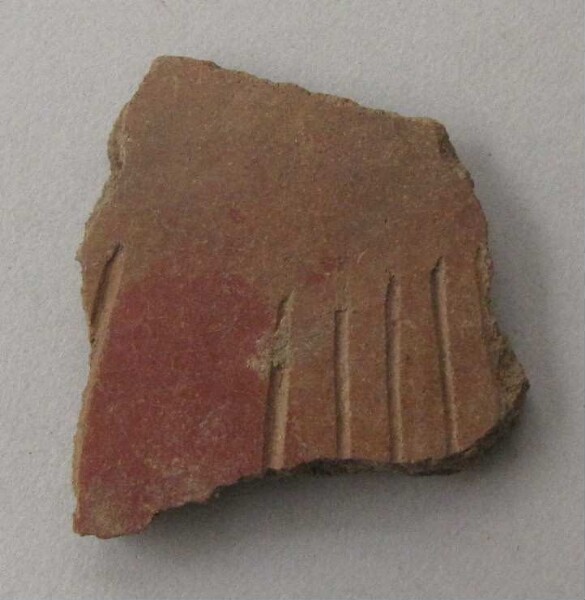 Clay shard of a vessel