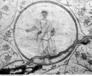 Christus mit der Rute im Clipeus, umgeben von Ranken