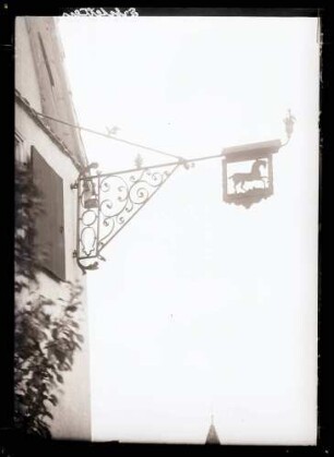 Wirtshausschild zum Rössle