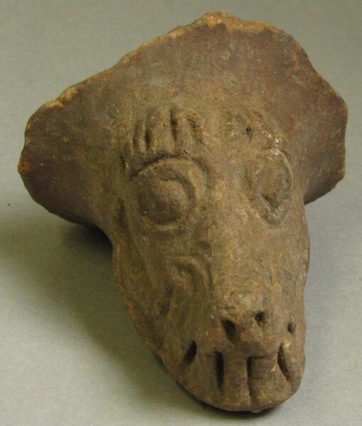 Clay animal head (vessel base)