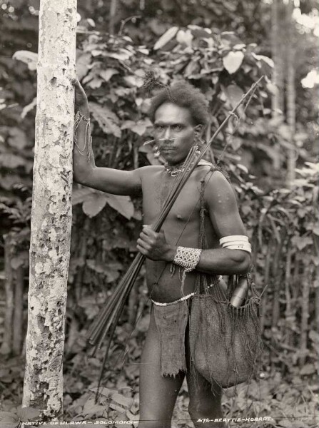 "Native with bow and arrows."