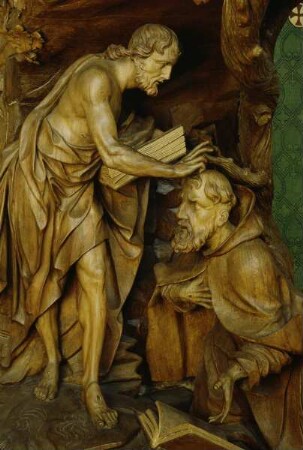 Figuren unter dem Kanzelkorb: Christus und der heilige Franziskus